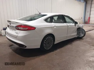 2017 Ford Fusion Titanium with VIN 3FA6P0K98HR124178, listed as a IAAI auction lot 42207938 with 89,352 mi miles and . Bid and sale history available at DreamBid. Image 4.