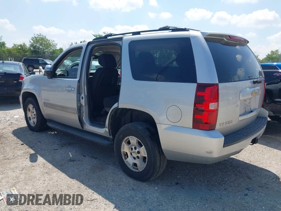 2013 Chevrolet Tahoe LS with VIN 1GNSCAE08DR153829, listed as a IAAI auction lot 42742266 with 216,821 mi miles and . Bid and sale history available at DreamBid. Image 3.