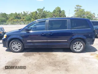 2014 Dodge Grand Caravan SXT with VIN 2C4RDGCG3ER266199, listed as a IAAI auction lot 42119064 with 148,067 mi miles and . Bid and sale history available at DreamBid. Image 15.