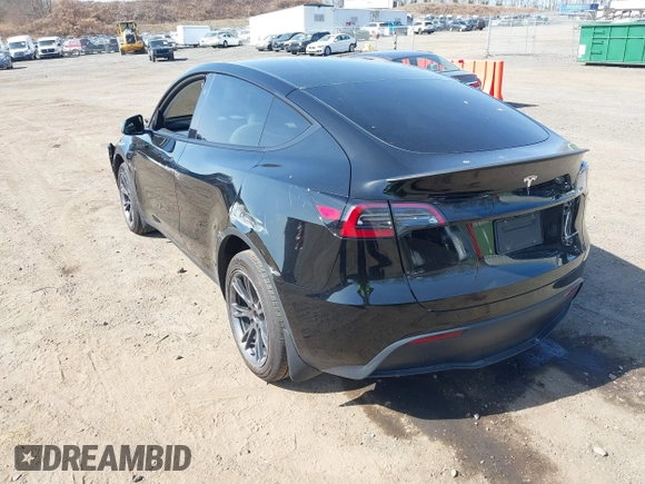 2025 Tesla Model Y Long Range with VIN 7SAYGDEEXSF267888, listed as a IAAI auction lot 41807129 with 3,002 mi miles and . Bid and sale history available at DreamBid. Image 3.