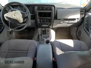 1998 Jeep Cherokee Sport z VIN 1J4FJ68S4WL101110, wystawiony jako Copart lot #57696755 z przebiegiem 218 254 mil mil oraz Szkoda całkowita • Salvage title. Historia ofert i sprzedaży dostępna na DreamBid. Obrazek 8.