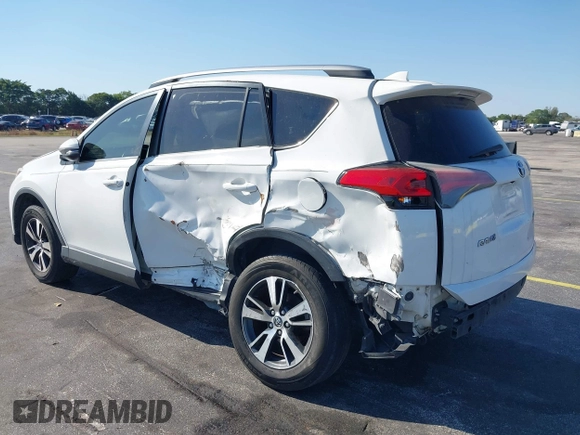 2018 Toyota RAV4 XLE with VIN JTMWFREV3JJ753454, listed as a IAAI auction lot 41775159 with 75,078 mi miles. Bid and sale history available at carsss.com. Image 6.