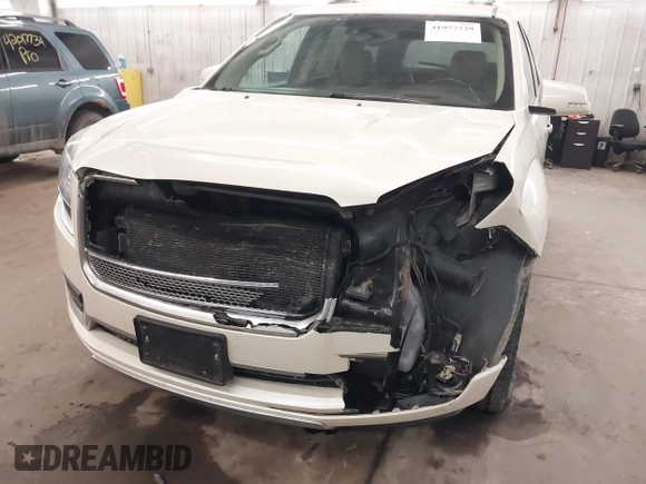 2014 GMC Acadia Denali with VIN 1GKKVTKD4EJ238869, listed as a IAAI auction lot 41957229 with 182,189 mi miles and . Bid and sale history available at carsss.com. Image 6.