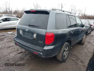 2006 Honda Pilot EX with VIN 5FNYF18496B021499, listed as a IAAI auction lot 41540784 with 232,665 mi miles and . Bid and sale history available at DreamBid. Image 4.