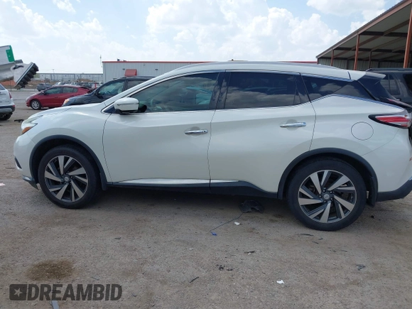 2015 Nissan Murano SL z VIN 5N1AZ2MH5FN213233, wystawiony jako IAAI lot #41869124 z przebiegiem 125 104 mil mil oraz . Historia ofert i sprzedaży dostępna na DreamBid. Obrazek 14.