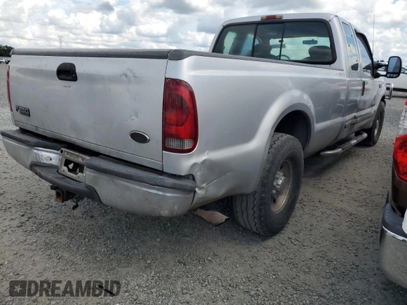 2001 Ford Super Duty F-250 XL with VIN 1FTNX20F61EB23095, listed as a Copart auction lot 74060304 with 458,656 mi miles and Salvage Title. Bid and sale history available at carsss.com. Image 3.