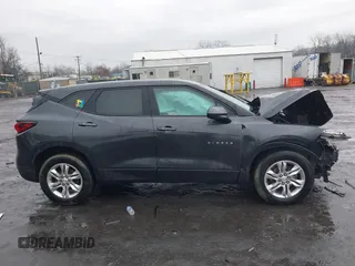 2021 Chevrolet Blazer LT z VIN 3GNKBHR46MS522595, wystawiony jako IAAI lot #41683458 z przebiegiem 93 613 mil mil oraz . Historia ofert i sprzedaży dostępna na DreamBid. Obrazek 13.