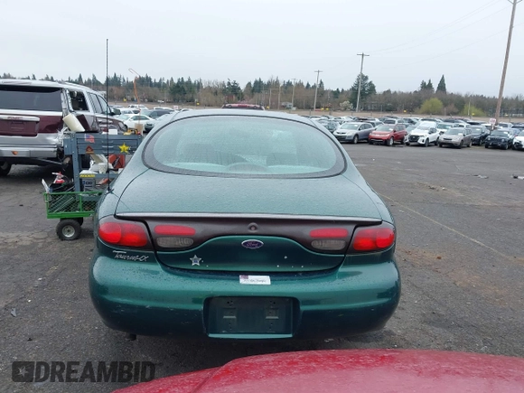 1999 Ford Taurus z VIN 1FAFP52S9XG309250, wystawiony jako IAAI lot #41797222 z przebiegiem 102 676 mil mil oraz . Historia ofert i sprzedaży dostępna na DreamBid. Obrazek 16.