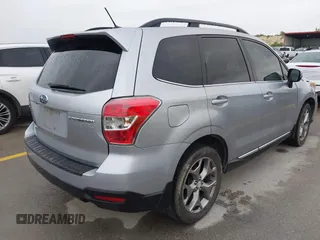 2015 Subaru Forester Touring with VIN JF2SJAUC8FH467730, listed as a IAAI auction lot 42403195 with 142,287 mi miles and . Bid and sale history available at DreamBid. Image 4.