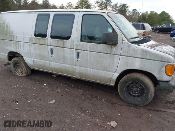 2003 Ford Econoline Cargo with VIN 1FTRE14203HB80127, listed as a IAAI auction lot 41462657 with 111,758 mi miles and . Bid and sale history available at DreamBid. Image 1.