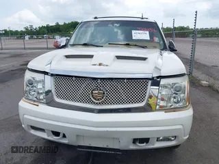 2004 Cadillac Escalade EXT z VIN 3GYEK62N04G123756, wystawiony jako IAAI lot #42361536 z przebiegiem 132 718 mil mil oraz . Historia ofert i sprzedaży dostępna na DreamBid. Obrazek 6.