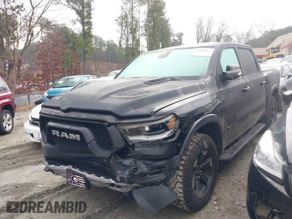 2019 Ram 1500 Rebel with VIN 1C6SRFLTXKN580782, listed as a IAAI auction lot 41498027 with 83,669 mi miles and . Bid and sale history available at DreamBid. Image 2.