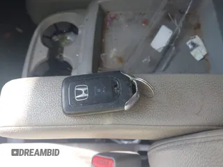 2015 Honda Odyssey Touring Elite with VIN 5FNRL5H95FB127156, listed as a IAAI auction lot 42618059 with 160,074 mi miles and . Bid and sale history available at DreamBid. Image 11.