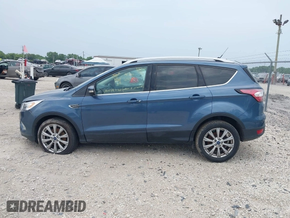 2018 Ford Escape Titanium z VIN 1FMCU0J91JUC00941, wystawiony jako IAAI lot #42679897 z przebiegiem 110 884 mil mil oraz . Historia ofert i sprzedaży dostępna na DreamBid. Obrazek 14.