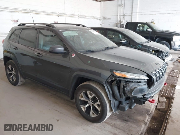 2016 Jeep Cherokee Trailhawk with VIN 1C4PJMBS0GW169184, listed as a IAAI auction lot 42255346 with 152,802 mi miles and . Bid and sale history available at DreamBid. Image 1.