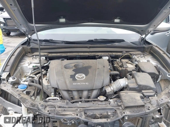 2021 Mazda CX-30 Premium with VIN 3MVDMADL7MM252507, listed as a IAAI auction lot 42338625 with 44,537 mi miles and . Bid and sale history available at DreamBid. Image 10.