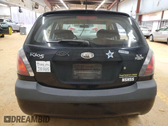 2009 Kia Rio LX with VIN KNADE243896580883, listed as a Copart auction lot 43735505 with 135,726 mi miles and Salvage Title. Bid and sale history available at carsss.com. Image 6.