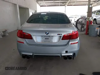 2014 BMW M5 z VIN WBSFV9C57ED097794, wystawiony jako IAAI lot #42257563 z przebiegiem 120 933 mil mil oraz . Historia ofert i sprzedaży dostępna na DreamBid. Obrazek 16.