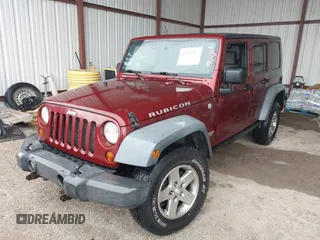 2010 Jeep Wrangler Unlimited Rubicon z VIN 1J4HA6H18AL180628, wystawiony jako IAAI lot #42110357 z przebiegiem 217 940 mil mil oraz . Historia ofert i sprzedaży dostępna na DreamBid. Obrazek 2.