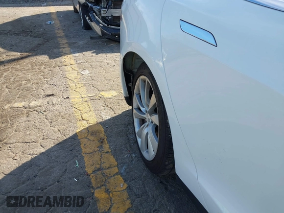 2014 Tesla Model S 60 with VIN 5YJSA1H13EFP62451, listed as a IAAI auction lot 41639068 with 88,000 mi miles and . Bid and sale history available at DreamBid. Image 20.