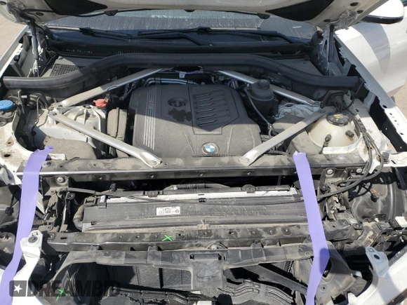 2022 BMW X6 xDrive40i z VIN 5UXCY6C0XN9K78927, wystawiony jako Copart lot #48348335 z przebiegiem 63 074 mil mil oraz Szkoda całkowita • Salvage title. Historia ofert i sprzedaży dostępna na DreamBid. Obrazek 12.