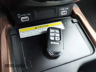 2022 Honda CR-V Touring with VIN 5J6RW2H99NL005329, listed as a IAAI auction lot 40781033 with 10,553 mi miles. Bid and sale history available at carsss.com. Image 11.