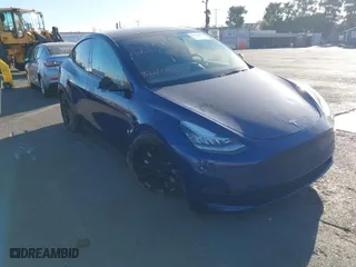 2023 Tesla Model Y Long Range with VIN 7SAYGDEE4PA035856, listed as a IAAI auction lot 41408305 with NaN miles. Bid and sale history available at carsss.com. Image 1.