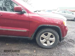 2012 Jeep Grand Cherokee Laredo with VIN 1C4RJFAG7CC123669, listed as a IAAI auction lot 42001472 with 164,806 mi miles. Bid and sale history available at carsss.com. Image 22.