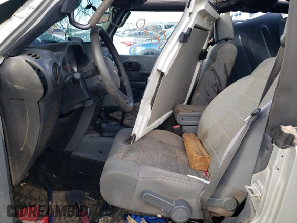 2007 Jeep Wrangler Rubicon with VIN 1J8GA64167L149306, listed as a Copart auction lot 69264743 with Not provided miles and Salvage title. Bid and sale history available at DreamBid. Image 7.