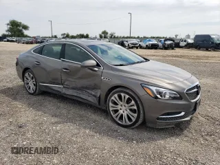 2019 Buick LaCrosse Avenir with VIN 1G4ZU5SS5KU125011, listed as a Copart auction lot 70301674 with 57,099 mi miles and Salvage Title. Bid and sale history available at carsss.com. Image 4.