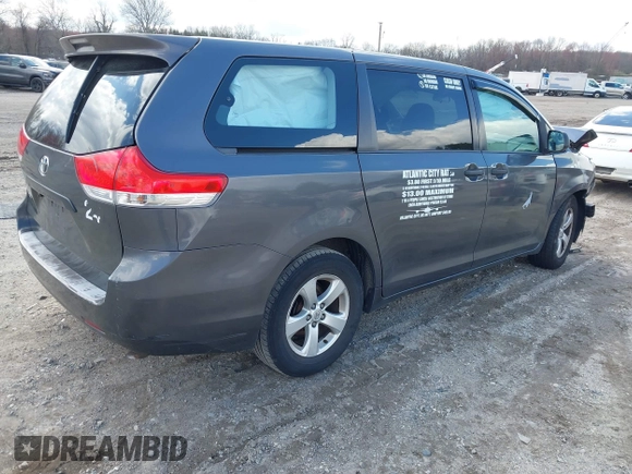 2014 Toyota Sienna L with VIN 5TDZK3DC4ES407928, listed as a IAAI auction lot 41887349 with 208,289 mi miles. Bid and sale history available at carsss.com. Image 4.
