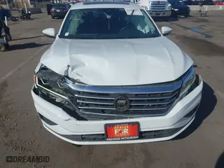 2021 Volkswagen Passat 2.0T SE with VIN 1VWSA7A32MC001319, listed as a IAAI auction lot 41603999 with 113,016 mi miles. Bid and sale history available at carsss.com. Image 6.