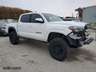 2020 Toyota Tacoma 4WD SR5 with VIN 5TFCZ5AN1LX218079, listed as a Copart auction lot 80085974 with 65,634 mi miles and Salvage Title. Bid and sale history available at carsss.com. Image 4.