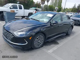 2023 Hyundai Sonata Hybrid Limited with VIN KMHL54JJ0PA061460, listed as a IAAI auction lot 42081519 with 54,624 mi miles. Bid and sale history available at carsss.com. Image 2.