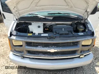 1999 Chevrolet Express Cargo with VIN 1GCHG35R3X1110004, listed as a Copart auction lot 59386095 with 141,925 mi miles and Salvage title. Bid and sale history available at DreamBid. Image 12.