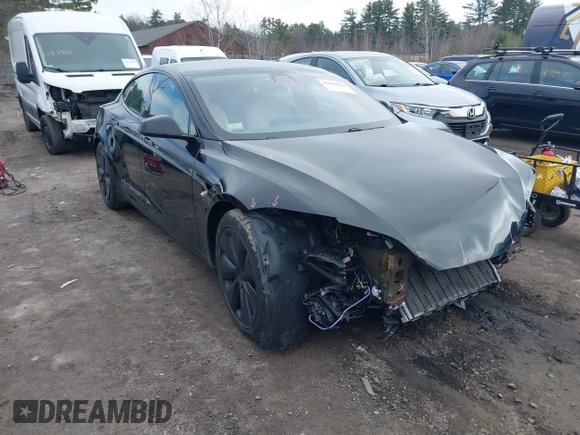 2021 Tesla Model S Plaid with VIN 5YJSA1E69MF439147, listed as a IAAI auction lot 41825656 with 25,626 mi miles. Bid and sale history available at carsss.com. Image 13.