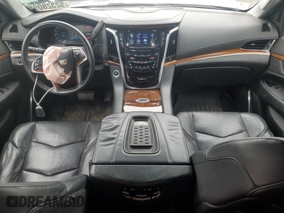 2017 Cadillac Escalade Luxury with VIN 1GYS4BKJ2HR236875, listed as a Copart auction lot 52328095 with 103,335 mi miles and Salvage title. Bid and sale history available at DreamBid. Image 8.