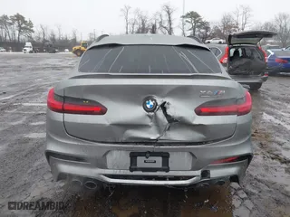 2021 BMW X4 M with VIN 5YMUJ0C01M9F26207, listed as a IAAI auction lot 41502307 with 31,995 mi miles. Bid and sale history available at carsss.com. Image 16.