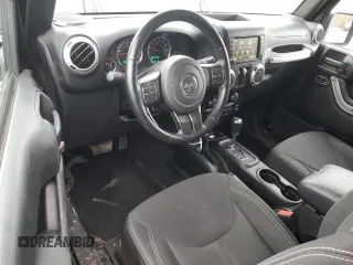 2018 Jeep Wrangler Sahara z VIN 1C4AJWBG0JL903053, wystawiony jako Copart lot #55486835 z przebiegiem 136 516 mil mil oraz Czysty tytuł • Clean title. Historia ofert i sprzedaży dostępna na DreamBid. Obrazek 8.