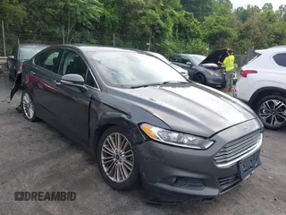 2015 Ford Fusion SE z VIN 3FA6P0T93FR140719, wystawiony jako IAAI lot #42507038 z przebiegiem 112 804 mil mil oraz . Historia ofert i sprzedaży dostępna na DreamBid. Obrazek 1.