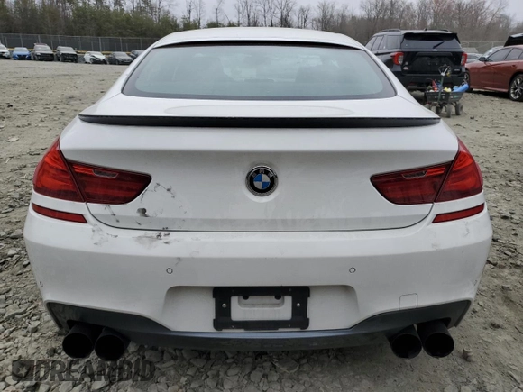 2014 BMW 6 Series 650i xDrive z VIN WBA6B4C54ED371324, wystawiony jako Copart lot #49016325 z przebiegiem 113 395 mil mil oraz Szkoda całkowita • Salvage title. Historia ofert i sprzedaży dostępna na DreamBid. Obrazek 6.