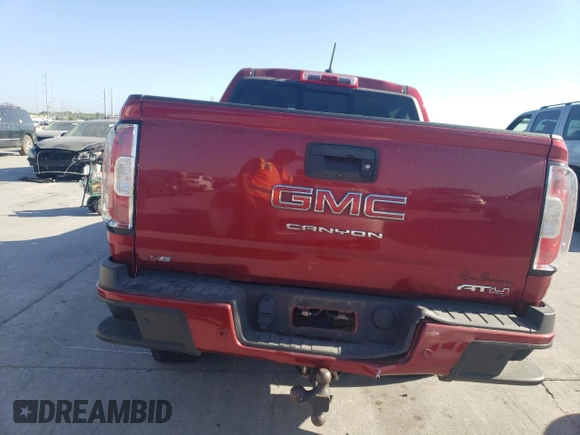 2021 GMC Canyon 4WD AT4 w/Cloth with VIN 1GTG6FEN2M1224875, listed as a Copart auction lot 77651494 with 81,495 mi miles and Salvage Title. Bid and sale history available at carsss.com. Image 6.
