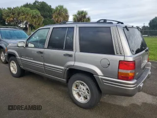 1998 Jeep Grand Cherokee Limited with VIN 1J4GZ78S2WC222768, listed as a Copart auction lot 73942154 with 0 mi miles and Salvage Title. Bid and sale history available at carsss.com. Image 2.
