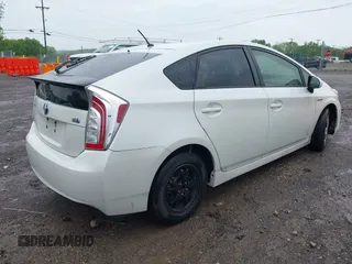 2015 Toyota Prius Four with VIN JTDKN3DU3F1882373, listed as a IAAI auction lot 42103396 with 240,242 mi miles. Bid and sale history available at carsss.com. Image 4.