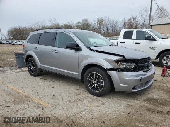 2017 Dodge Journey SE with VIN 3C4PDCAB9HT573188, listed as a Copart auction lot 51996425 with 121,978 mi miles and Salvage Title. Bid and sale history available at DreamBid. Image 4.