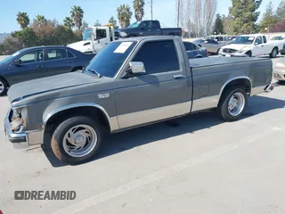 1987 GMC Sonoma with VIN 1GTBS14E2H8501760, listed as a IAAI auction lot 41852033 with 175,529 mi miles and . Bid and sale history available at DreamBid. Image 2.