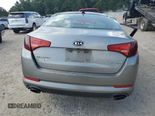 2013 Kia Optima EX с VIN 5XXGN4A77DG213051, выставлен на аукционе Copart как лот 58849865 с пробегом Не указан миль и Списание • Salvage title. История ставок и продаж доступна на DreamBid. Изображение 6.