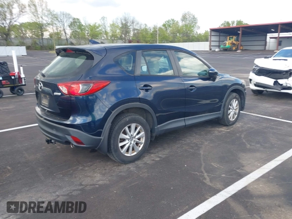 2016 Mazda CX-5 Sport with VIN JM3KE2BY3G0740488, listed as a IAAI auction lot 42000449 with 43,009 mi miles. Bid and sale history available at carsss.com. Image 4.
