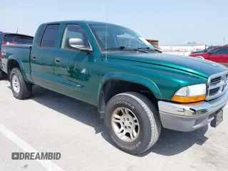 2003 Dodge Dakota SLT z VIN 1D7HG48NX3S278974, wystawiony jako IAAI lot #42236636 z przebiegiem 105 211 mil mil oraz . Historia ofert i sprzedaży dostępna na DreamBid. Obrazek 1.
