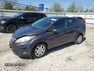 2012 Ford Fiesta SE with VIN 3FADP4BJ7CM157588, listed as a Copart auction lot 52411945 with 124,989 mi miles and Salvage Title. Bid and sale history available at carsss.com. Image 1.